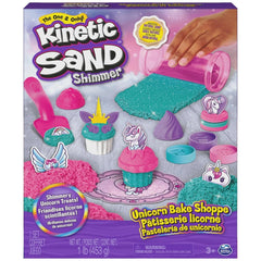 Kinetic Sand Unicorn Bake Shoppe kit features pink and purple molds, sand shimmer, and unicorn decorations in a vibrant packa