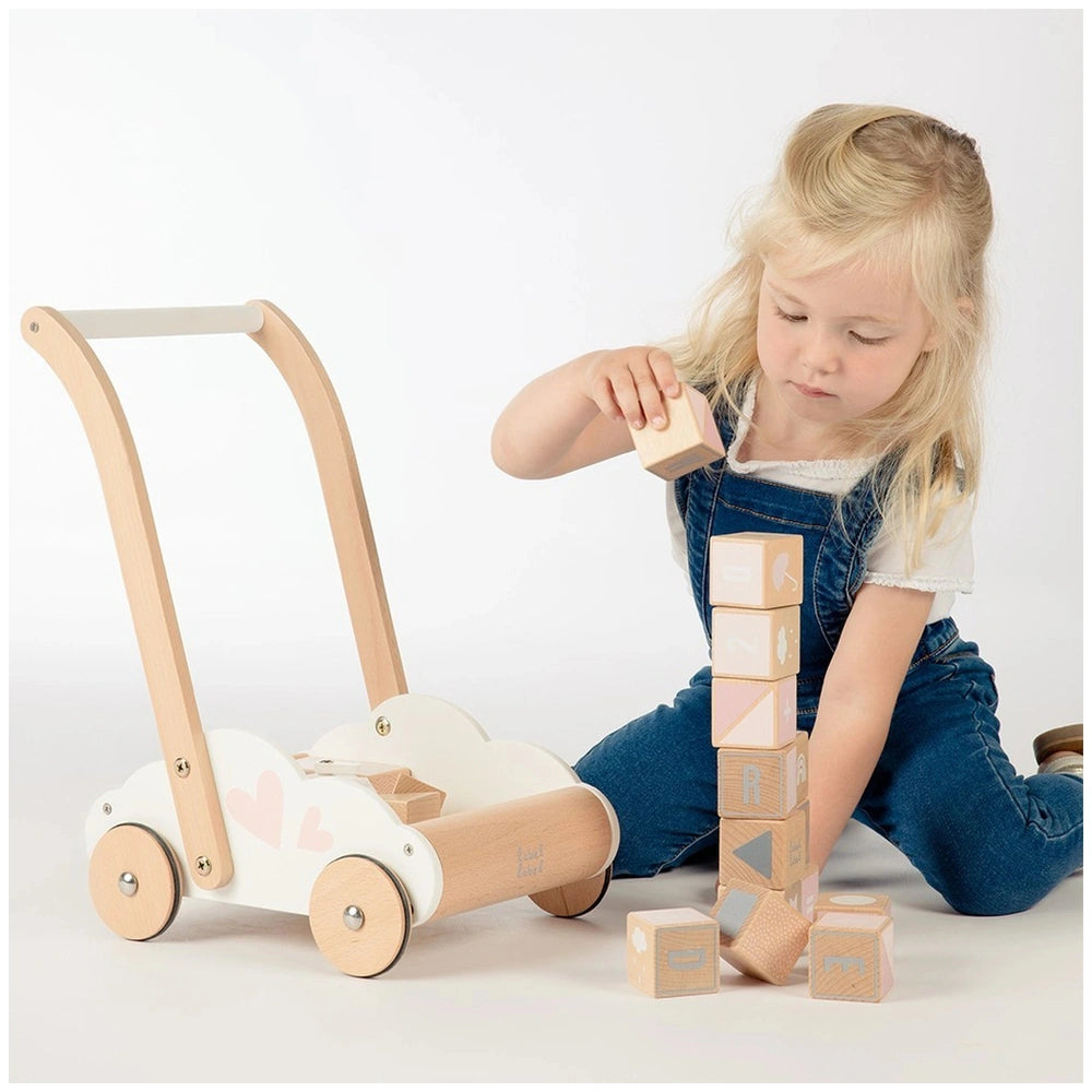 Label-Label educational baby walker with wooden blocks and a girl playing, promoting interactive learning and motor skills.