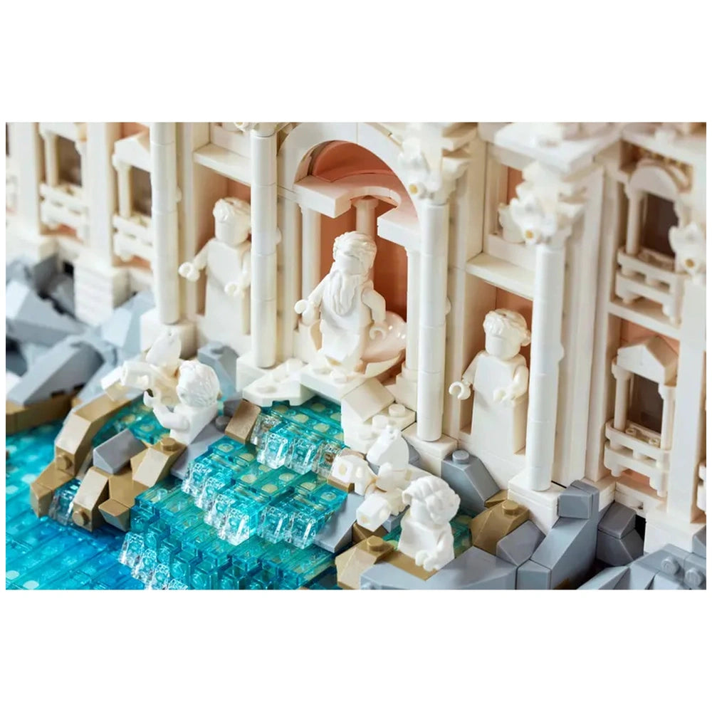 Lego Trevi Fountain construction set features a detailed white model with blue and gray accents, showcasing a building and wa