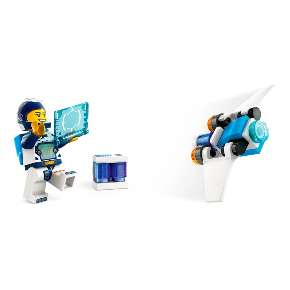 A LEGO® astronaut figure interacts with a blue control panel while a small, sleek white spaceship with orange thrusters hovers nearby.