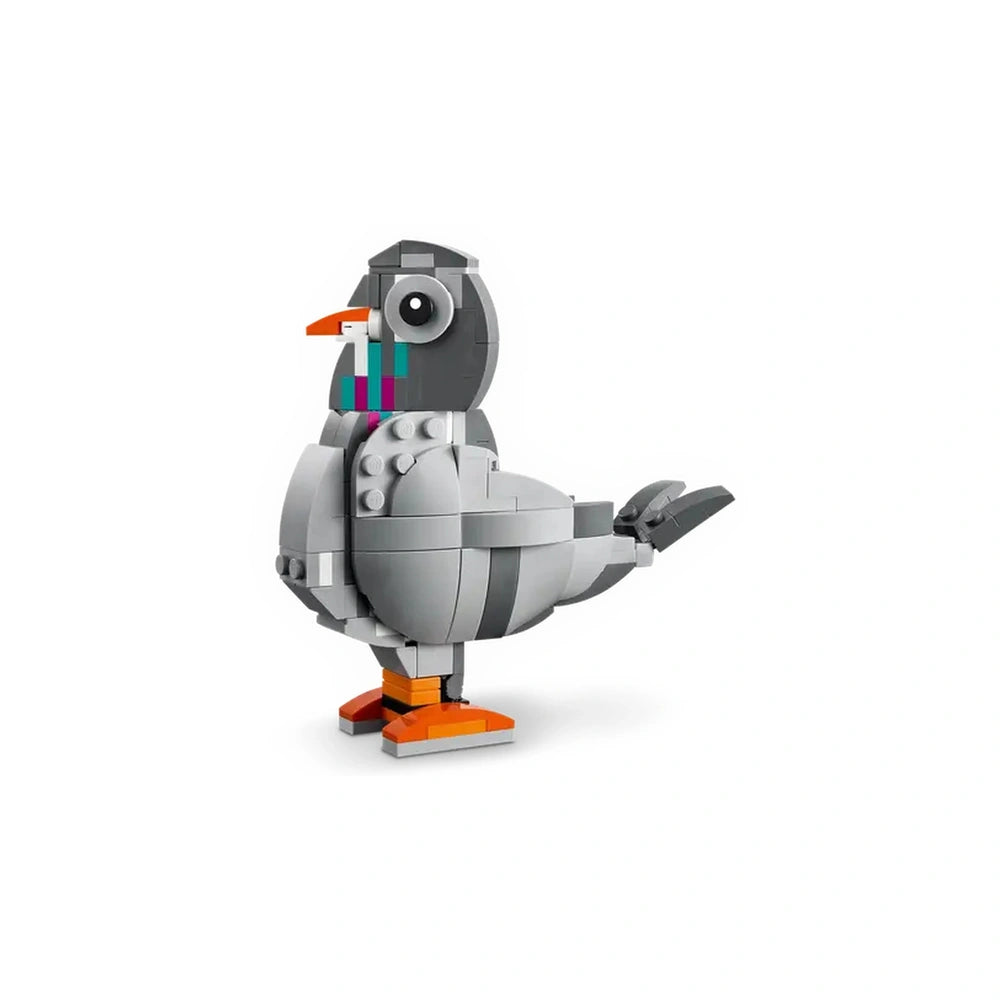 A charming LEGO Creator 3in1 Playful Cat construction set featuring a posable gray cat with vibrant accessories, including a toy mouse and yarn, set against a white background.