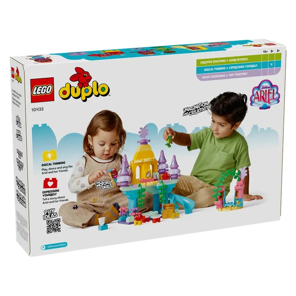 Two children playing together with the LEGO® DUPLO® Ariel’s Magical Underwater Palace construction set, featuring a colorful castle with towers and underwater elements.