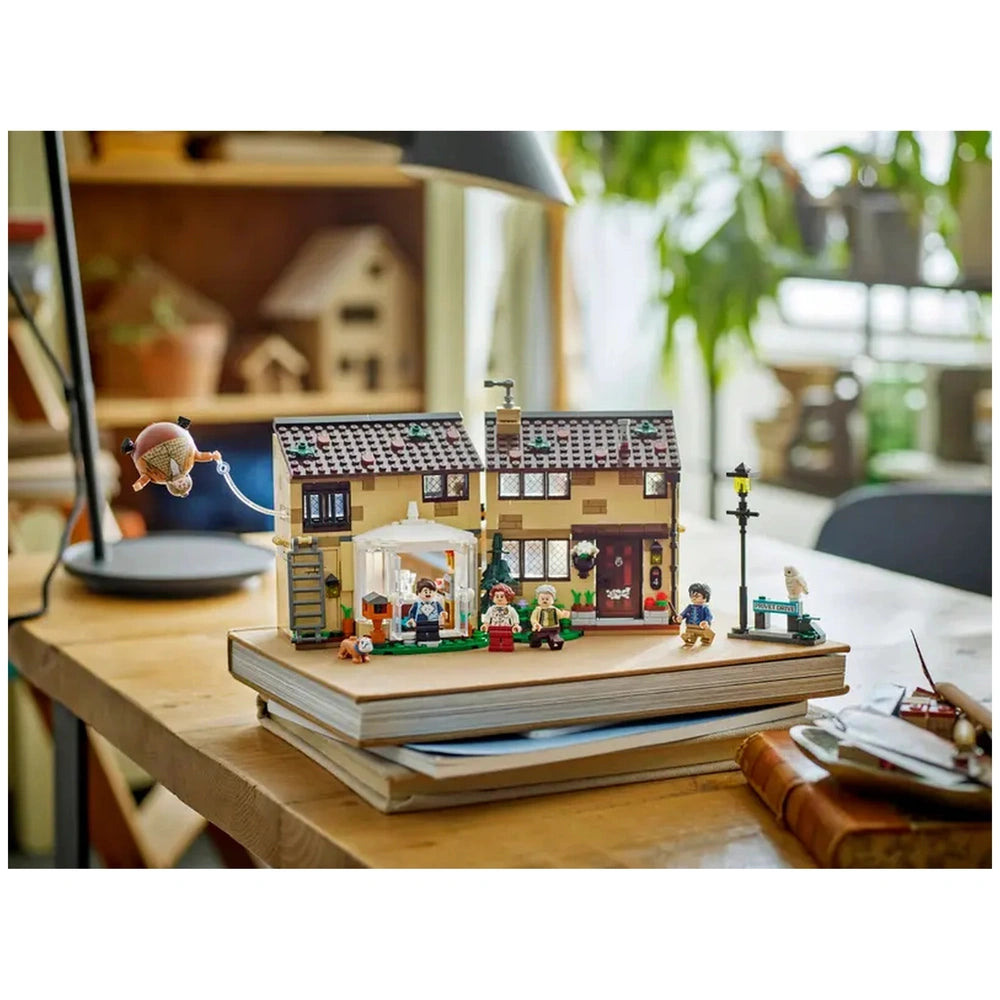 LEGO Harry Potter playset featuring Aunt Marge's Visit, showcasing a detailed Dursley house with characters and a flying Aunt Marge figure.