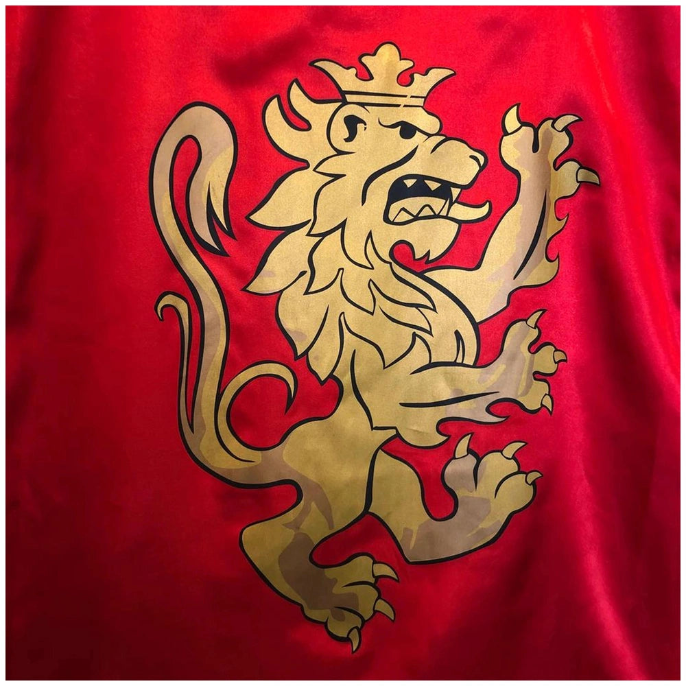 Liontouch red knight cape featuring a golden lion with a crown, raised paws, and open mouth on smooth glossy fabric.