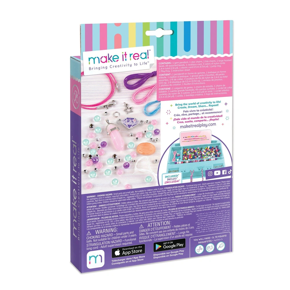 Positive Gems Jewelry packaging features purple matte cardboard, colorful beads, and accessories like a bracelet, hair tie, a