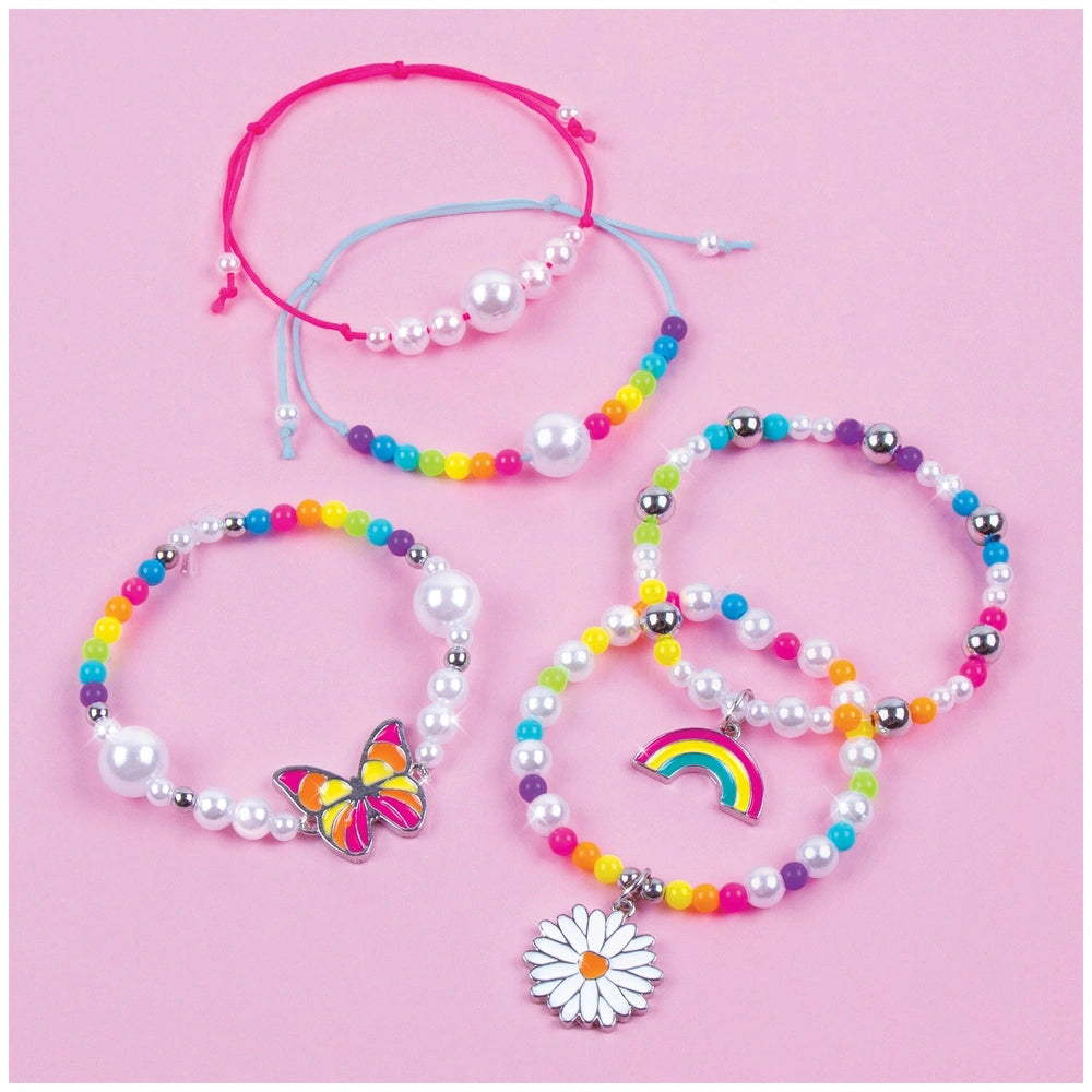 Rainbow Treasure Bracelets featuring glossy beads, metallic butterfly charm, and colorful designs in a centered layout.