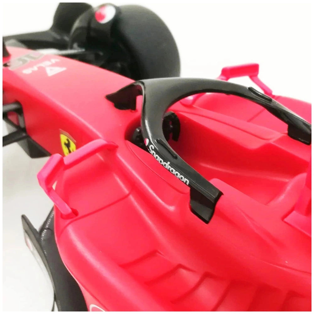Mondo Ferrari F1 75 radio-controlled vehicle in vibrant red with glossy plastic finish and black components.