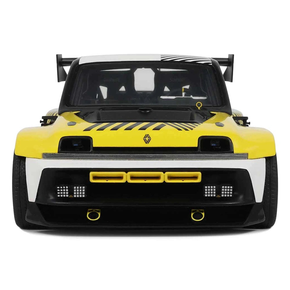 RC Renault 5 Turbo 3E in yellow and black with detailed front view showcasing bumpers, mirrors, and wheels.