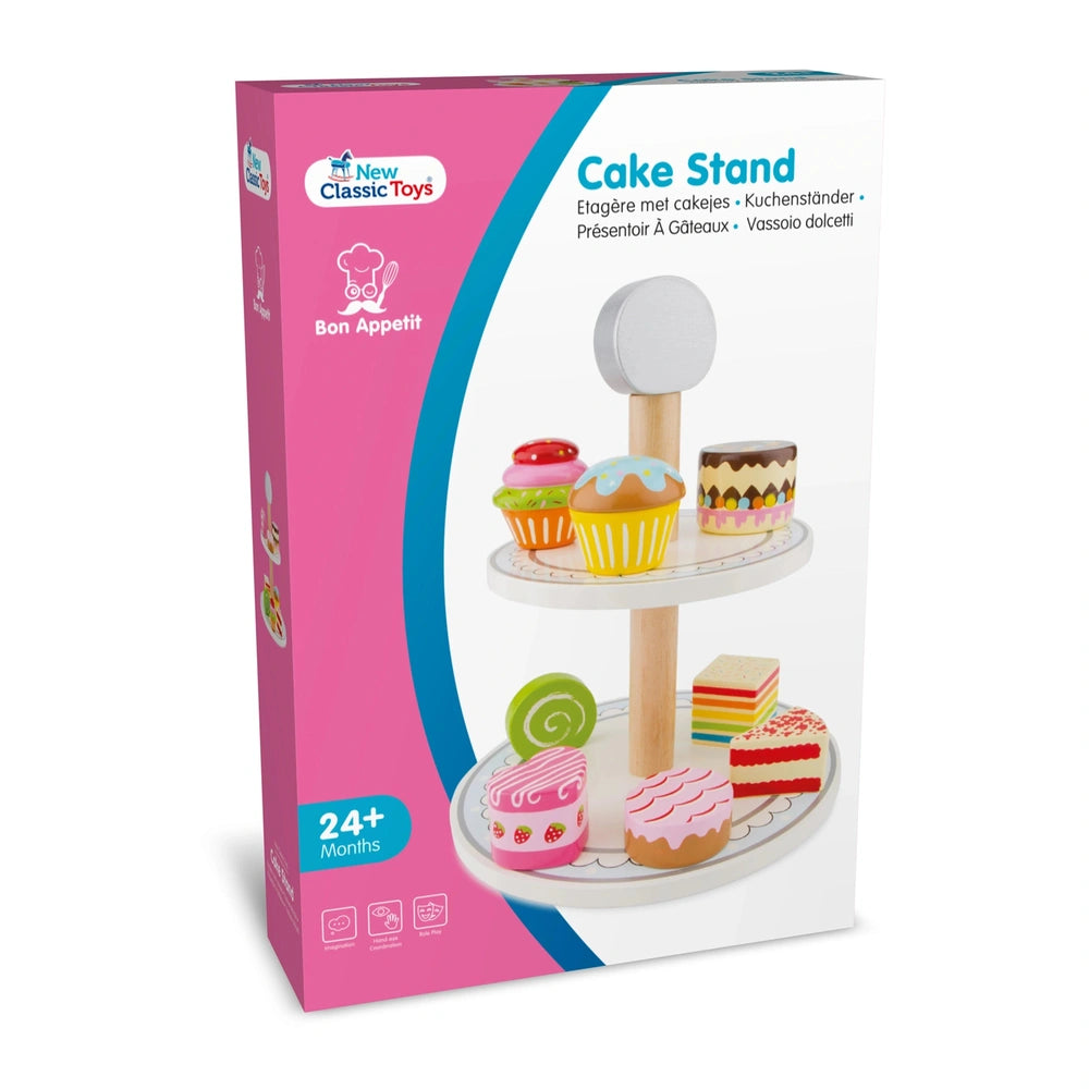 New Classic Toys Cake Stand Set features colorful cakes and accessories on pink, blue, and white retail packaging.