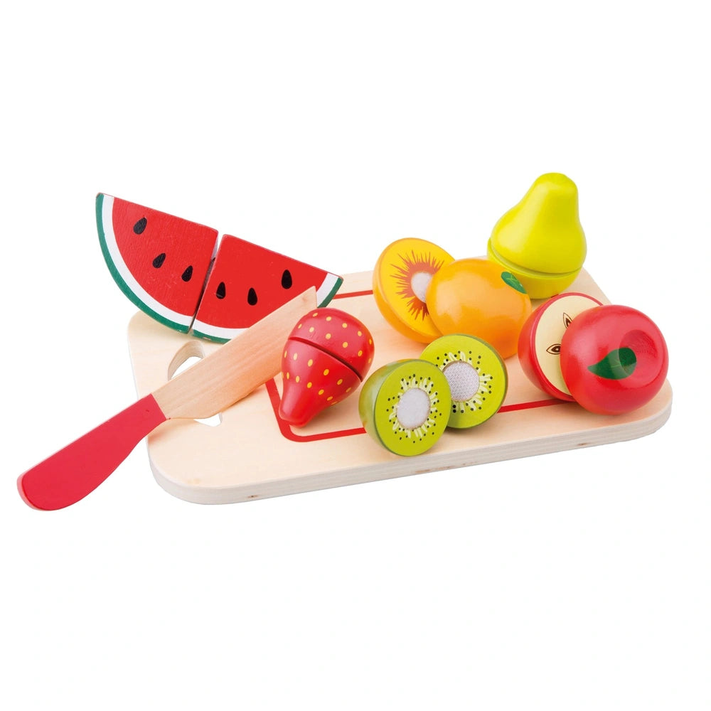 Cuttingset with wooden board, plastic knife, and colorful fruit pieces: watermelon, kiwi, pear, apple, and lime.