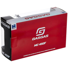 Gasgas MC 450F dirt bike die cast model in red packaging with a white plastic window and handle.