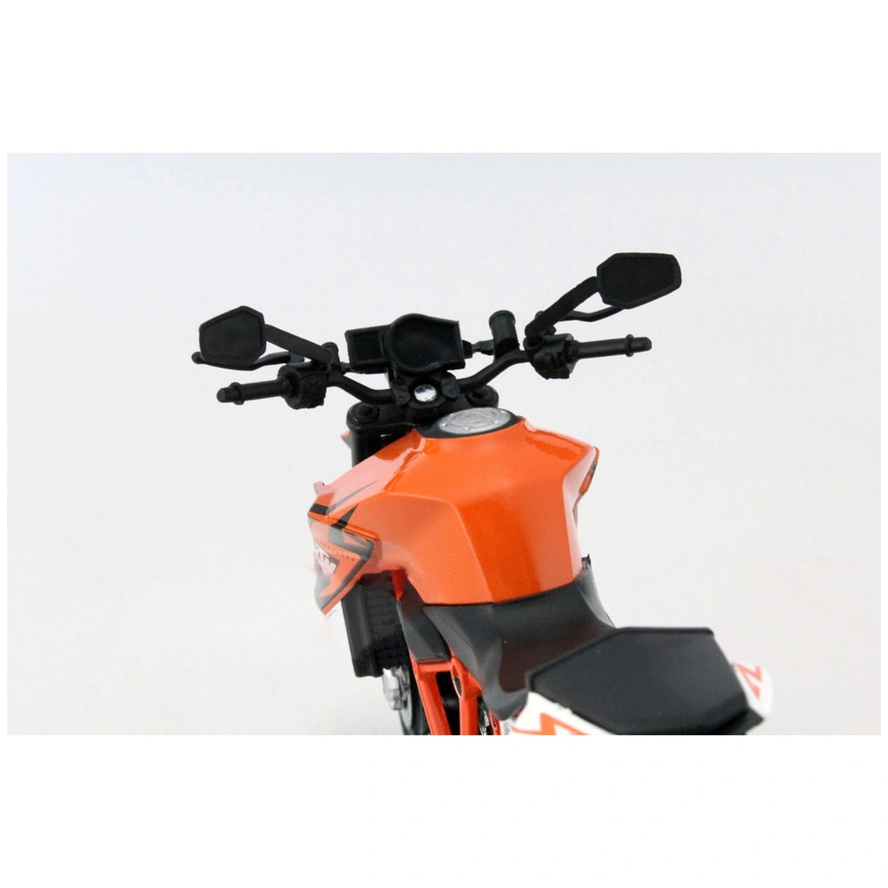 KTM 1290 Superduke R die-cast motorcycle in orange and black, featuring shiny plastic, leather-like seat, and detailed compon
