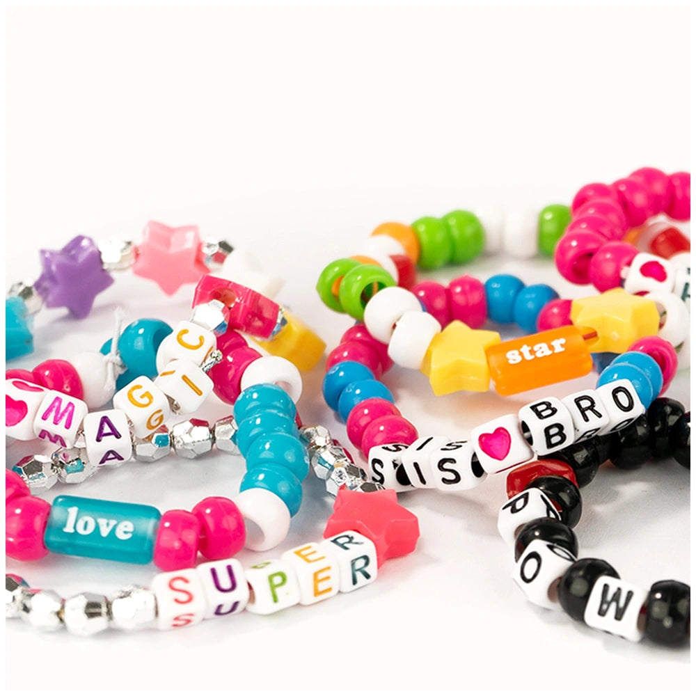 Beads ABC Magic Unicorn 500 set featuring colorful plastic beads and connectors arranged in multiple vibrant bracelets.