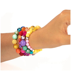 Multi-colored glossy beads arranged on a bracelet with a metallic clasp, showcasing shades of blue, green, yellow, pink, and 