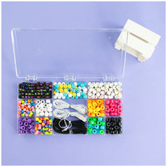 Beads ABC Pcs 500 Fluo Set in a plastic container features colorful plastic beads in various vibrant shades.