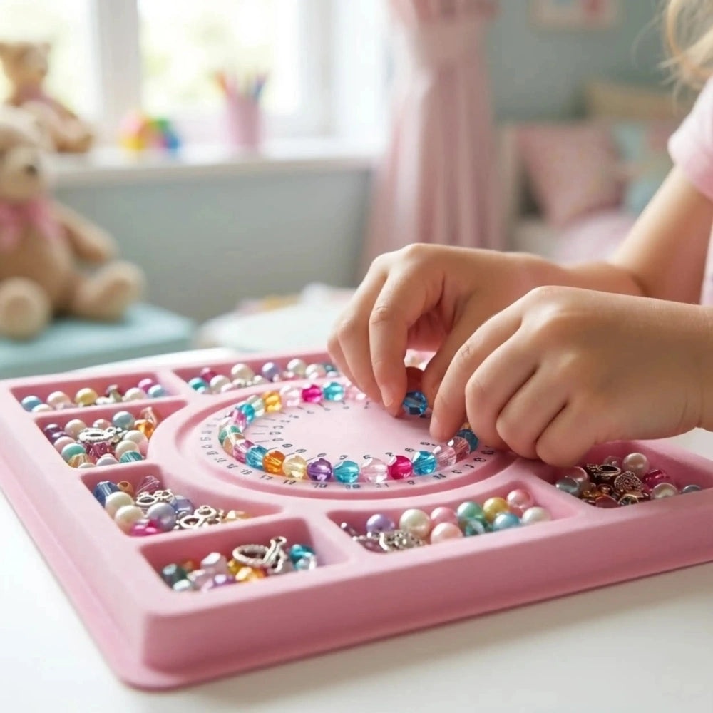 Jewel Design 600 Precious Beads in a pink tray with compartments, showcasing colorful glass beads and a person's hands.