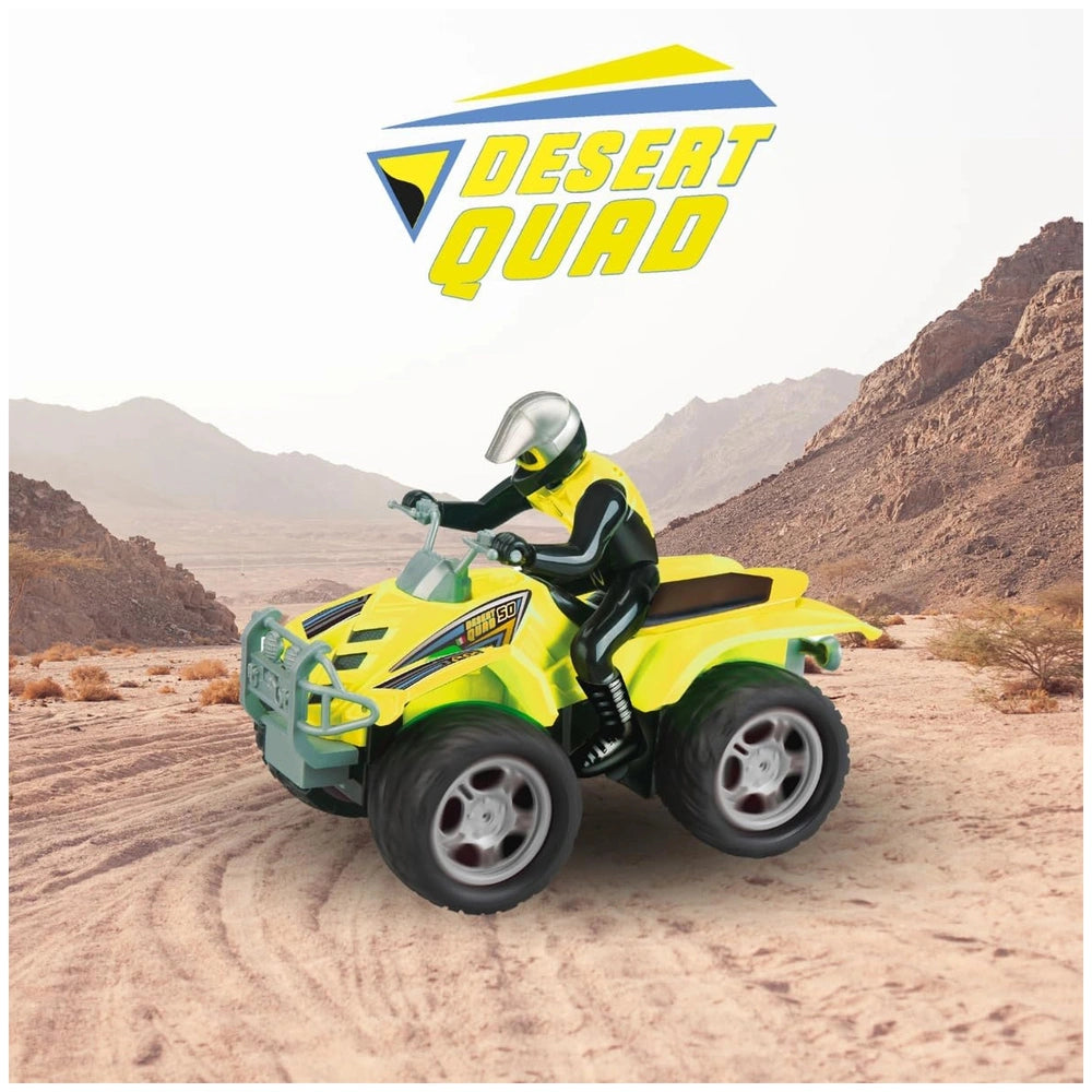 RCRadiocomDesertQuad18 ATV in yellow and black, ridden by a person in a reflective suit and helmet, outdoors.