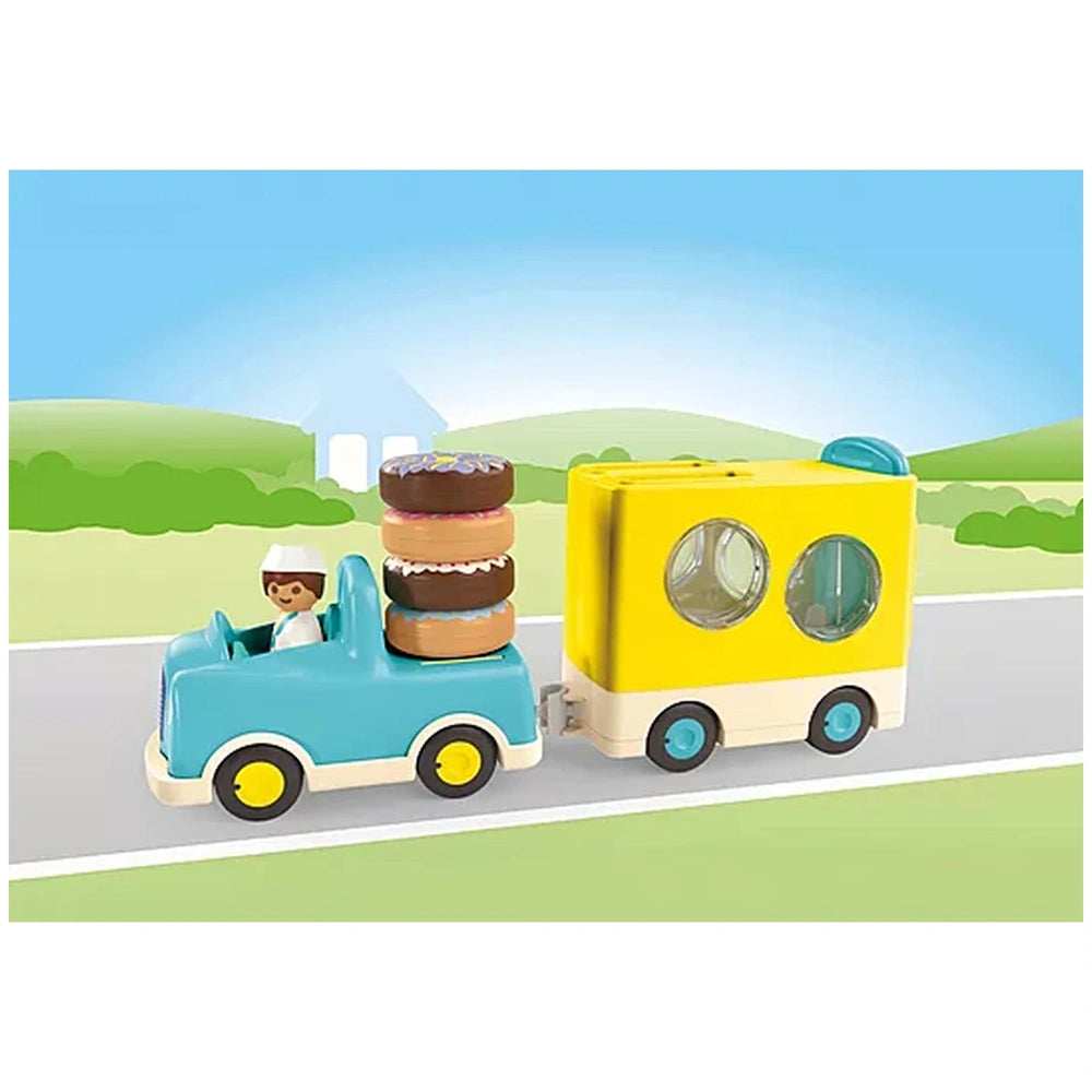 Playmobil Crazy-Donut-Truck features a blue and yellow plastic truck with three brown and white donuts.