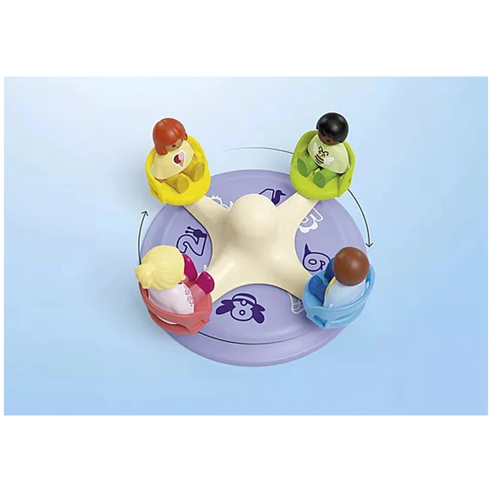 Playmobil Junior Number Merry-Go-Round toy features a large white figure with purple and pink accents, surrounded by colorful