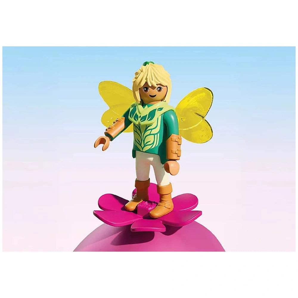 Playmobil Magic Unicorns Cozy Fairy Home toy features a blonde humanoid figure in a green top, white pants, and brown boots o