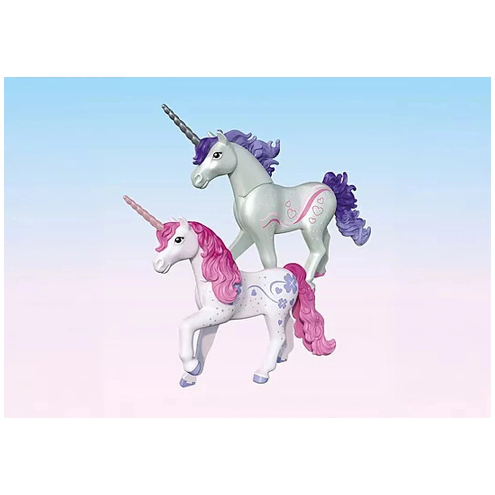 Playmobil Magic Unicorns toy playset featuring two glossy unicorn figures with pink and purple manes against a light blue bac