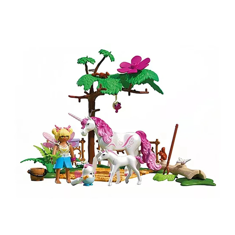 Playmobil Magical Unicorn Stable toy playset in retail packaging featuring unicorn, horse, and sheep with vibrant flowers.