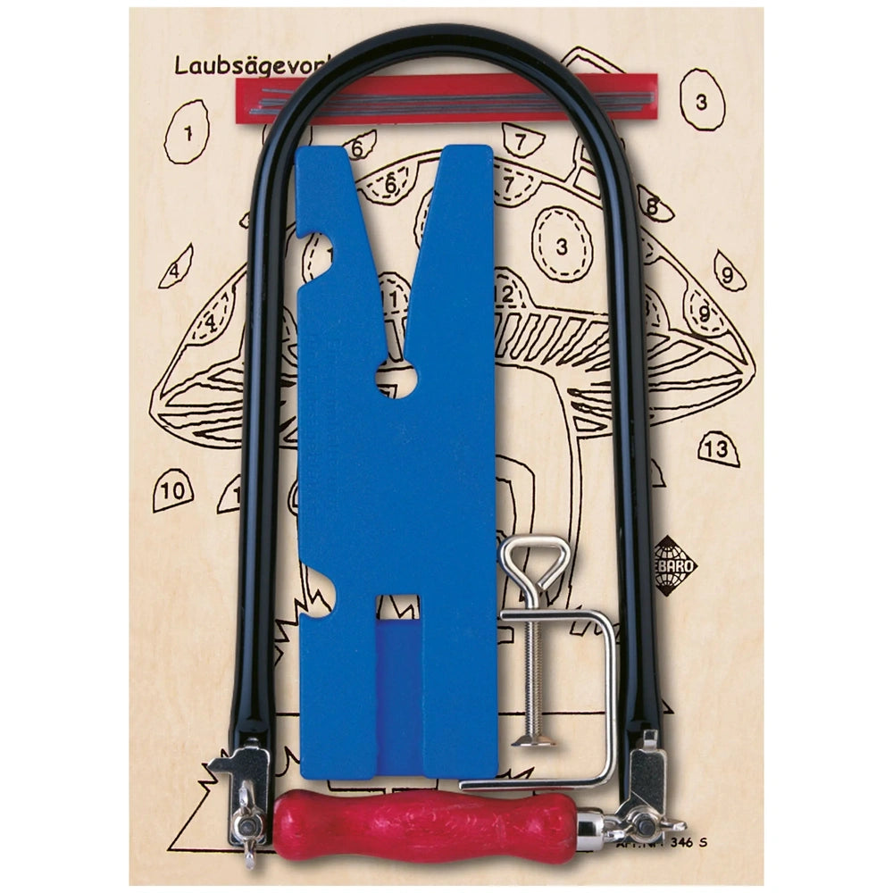 Fretsaw set with blue frame and red handle on a wooden pattern board, includes various small tools and saw blades.