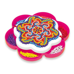 Quercetti FantaColor Mandala features stacked pink plastic bowls filled with colorful round beads arranged in a circular patt