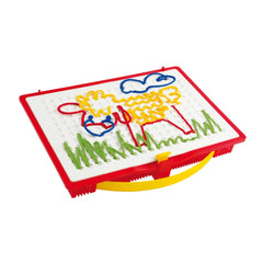 Quercetti Filo Filo arts and crafts kit features a white surface with red border, green, blue, and yellow lines, and a handle