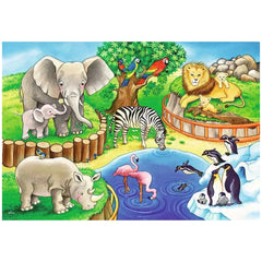 Ravensburger puzzle features a vibrant illustration of zoo animals including an elephant, zebra, flamingo, rhino, and giraffe