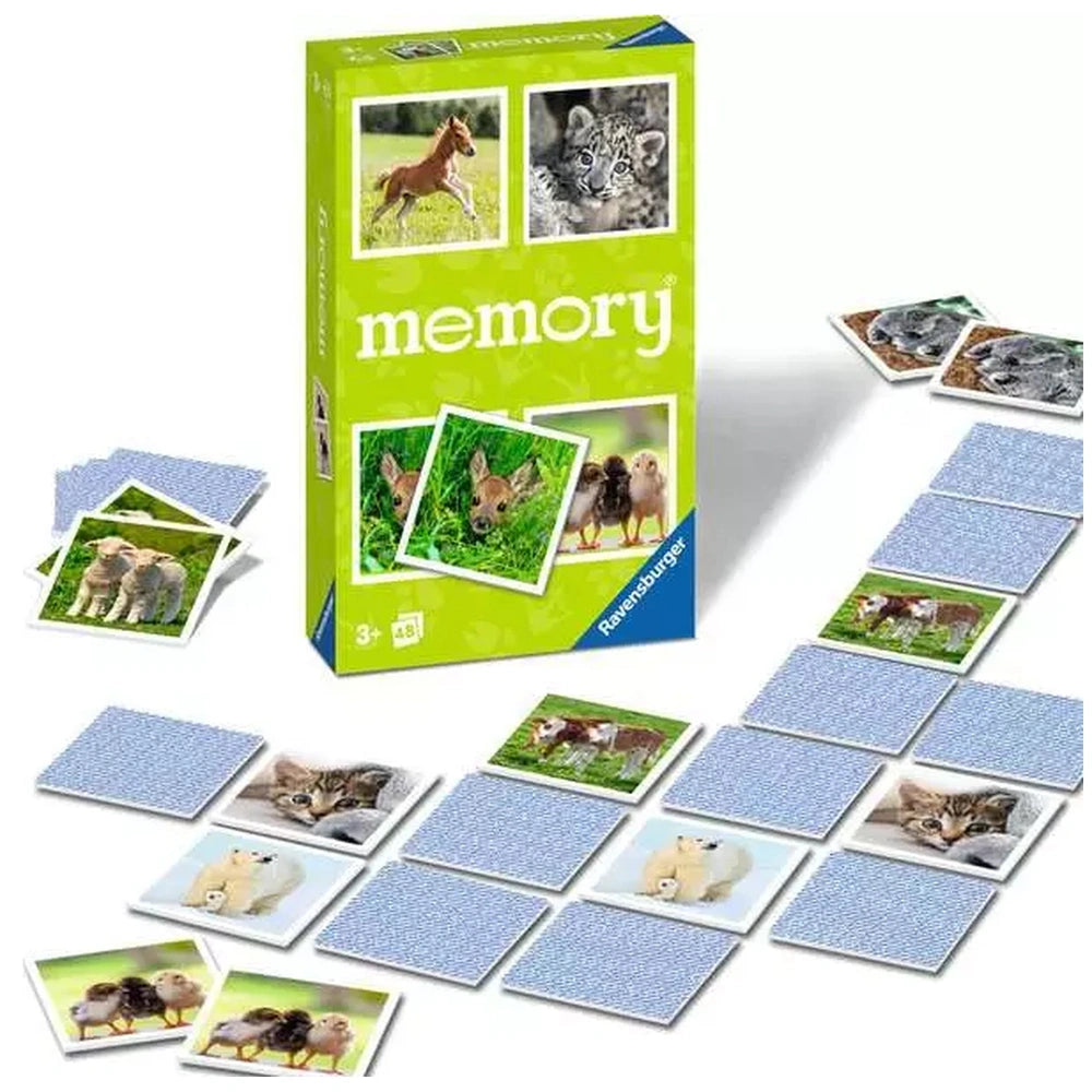 Ravensburger Baby Animal Memory card game features colorful animal images on cards spread out from an open box on the floor.