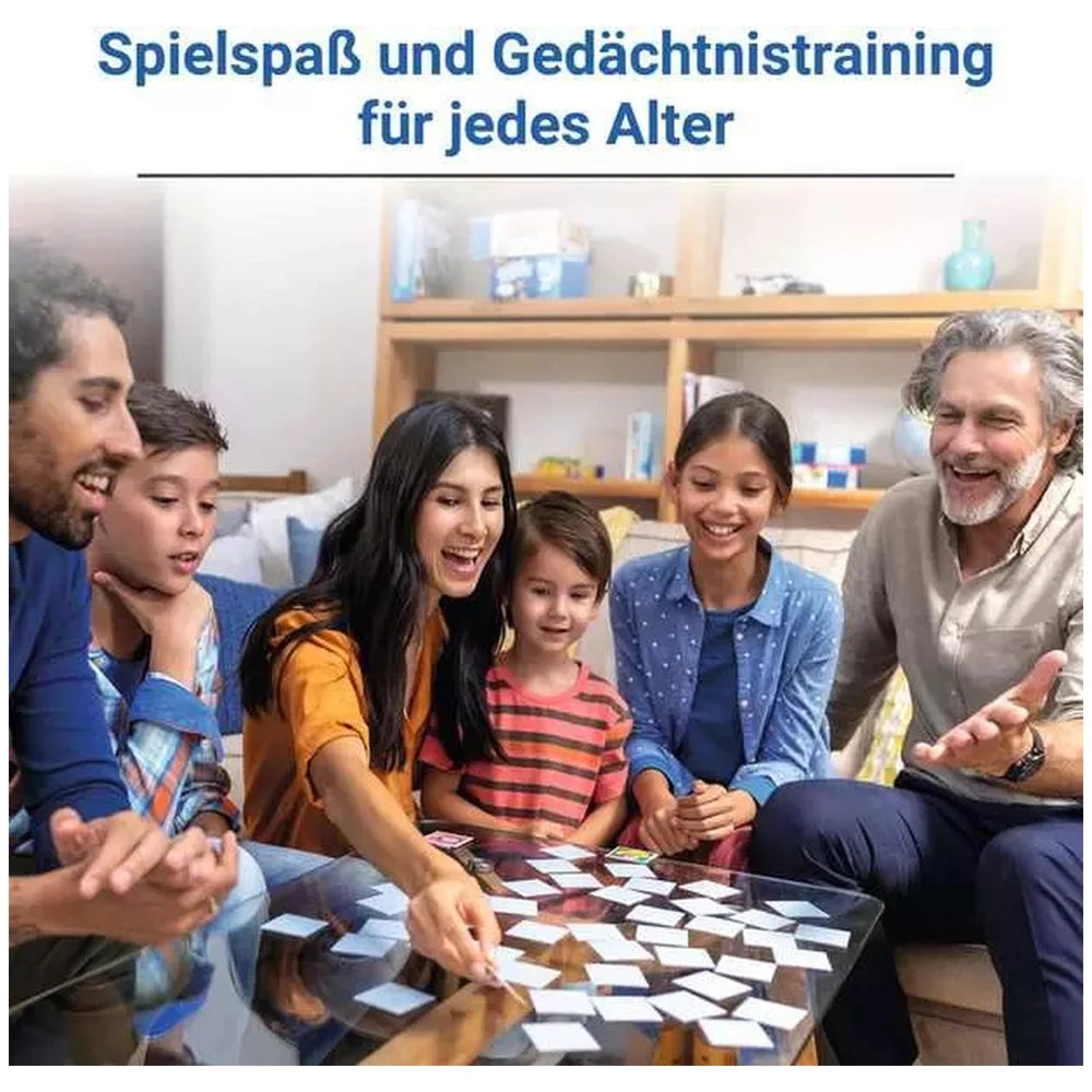 Ravensburger Baby Animal Memory card game being played by a diverse group of smiling adults and children around a table.