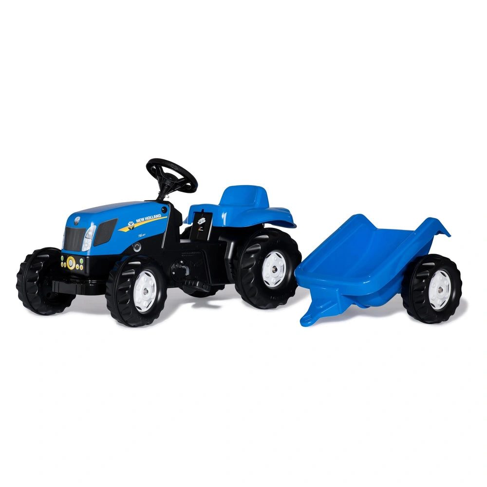 Rolly Toys Rollykid New Holland Tractor features a blue body and black wheels, paired with a matching trailer on a white back