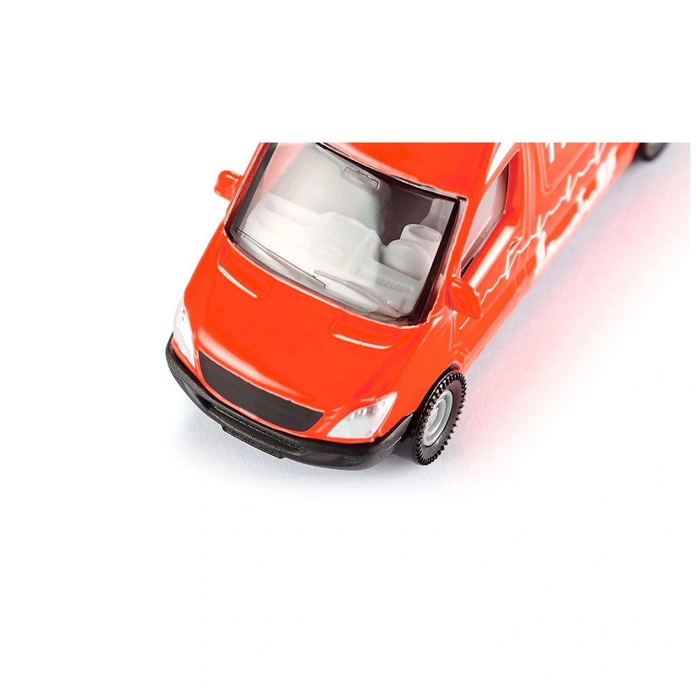 Red toy ambulance truck with a glossy finish, featuring black accents and a simplistic design against a white background.