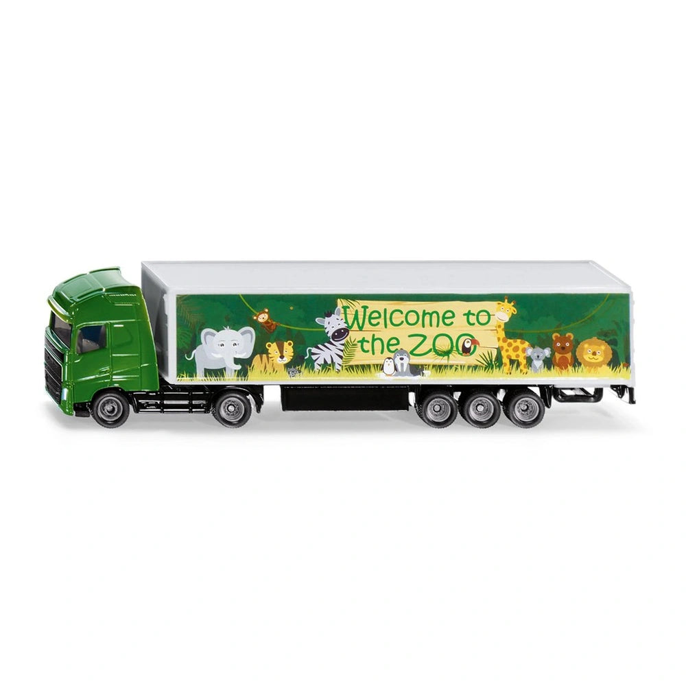 Articulated toy truck in green with a colorful zoo-themed trailer featuring animals and playful text on a white background.