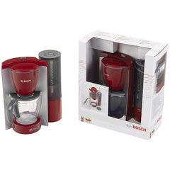 Theo Klein Bosch coffee maker in red plastic with a black base, presented in white cardboard packaging with black printed tex