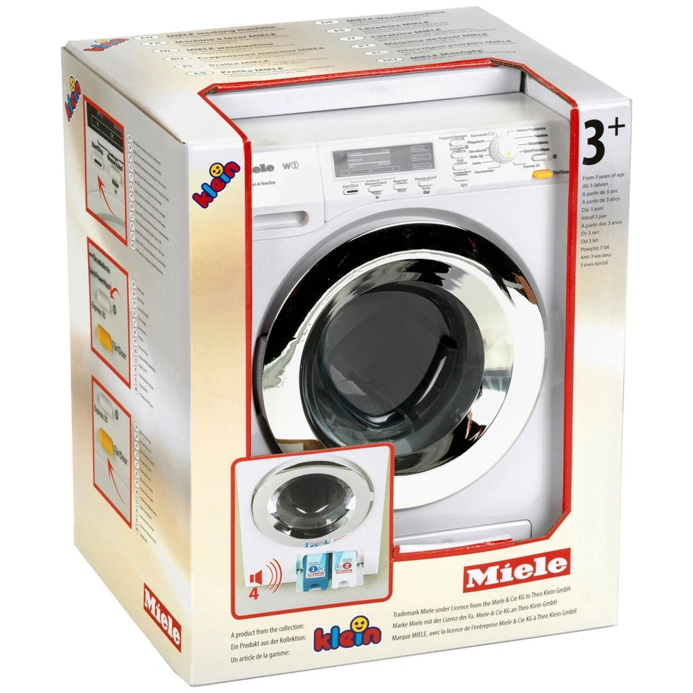 Theo Klein Miele washing machine in white packaging with glossy finish, featuring a black glass door and colorful control pan