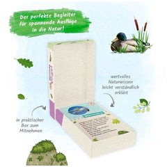 TROTSCH Learning Cards for Native Birds in German edition, displayed in an open box with a green leaf and a small bird.